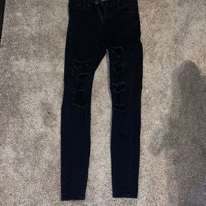 Black distressed skinny jeans